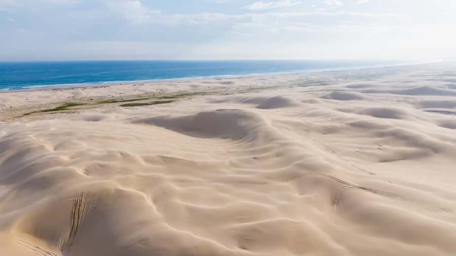 Port Stephens: Stockton Sand Dunes 4WD Tag-Along Tour - Sandboarding Down Stockton’s Slopes