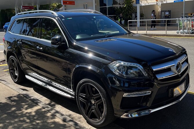 Private Transfer FROM Sydney Airport to Sydney CBD for 1 to 2 pax - The airport-to-CBD ride, from arrivals to your hotel