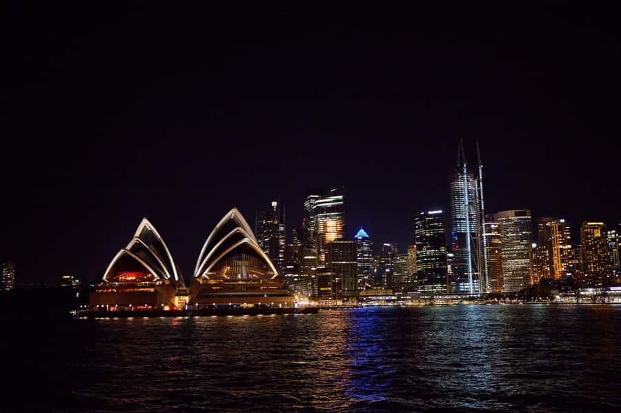 Sydney: Big Bus Panoramic Night Tour by Open-Top Bus - Crossing the Harbour Bridge toward Milsons Point