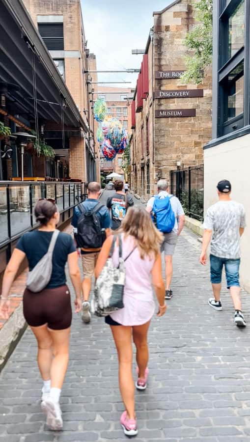 Sydney: City & The Rocks 3.5-Hour Walking Tour with a Drink - Architecture and city life at the Queen Victoria Building