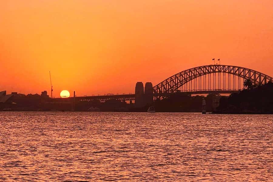 Sydney: Golden Glow Sunset Harbour Cruise with 1 Drink - Friendly crew, limited commentary