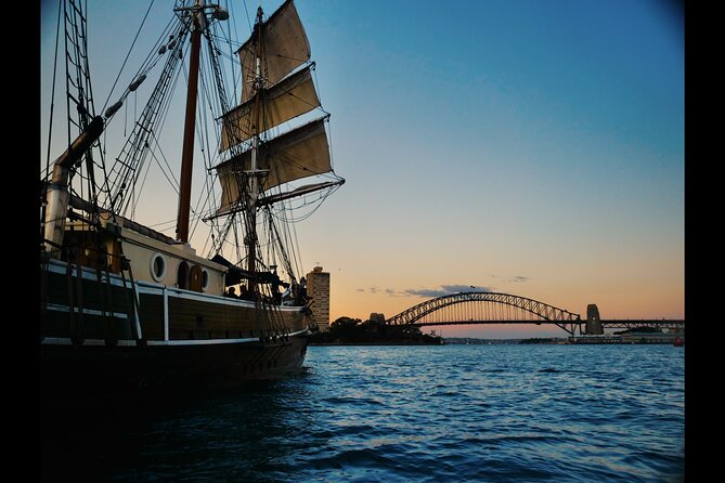 Sydney Harbour Tall Ship Twilight Dinner Cruise - A historic ship at twilight, not a standard harbour ferry